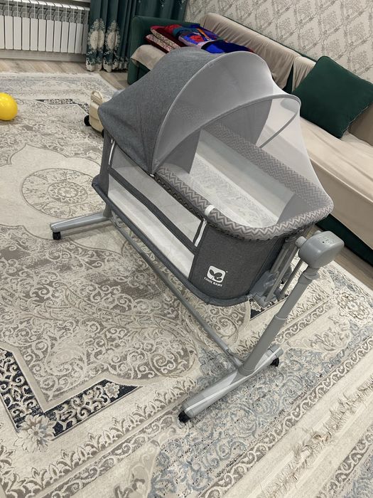 Электронный манеж-кровать