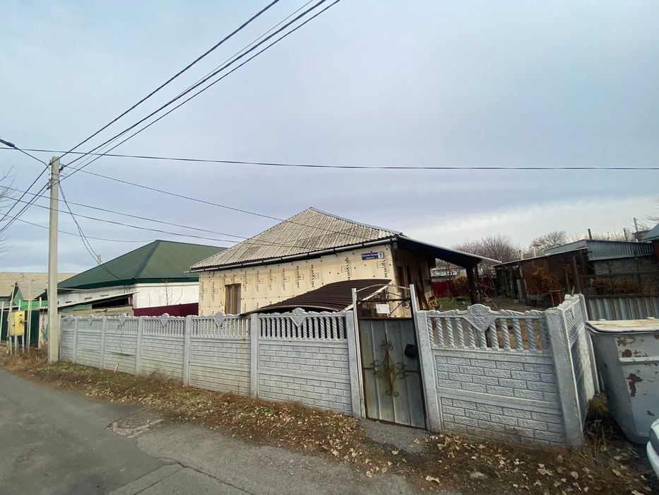 Дом, улица Калиева, Танат Империя