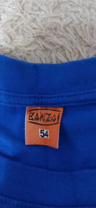 Продам новую футболку