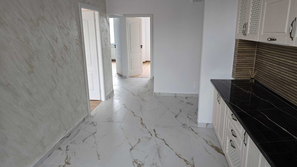 Apartament cu 3 camere Decomandat 2 bai 70 mp pe mijloc 62500