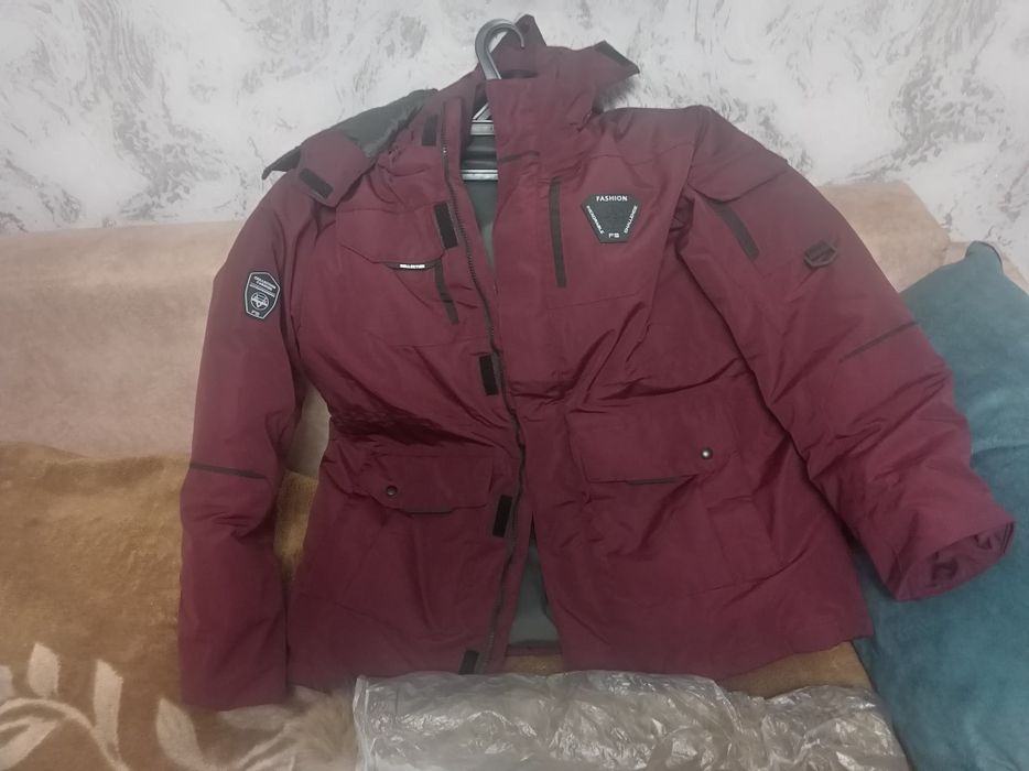 Продам новый пуховик