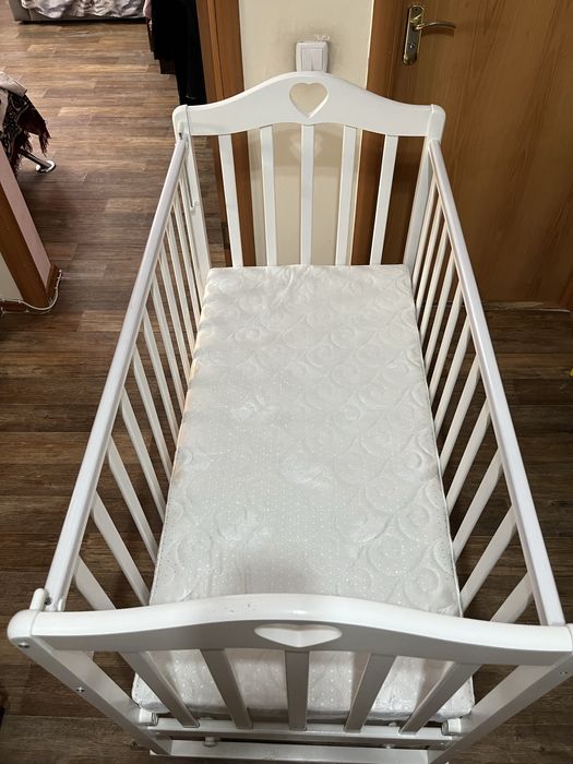 Кроватка с маятником