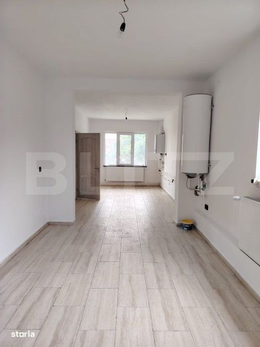 Casa de vanzare, cu 6 camere, 288 mp, zona Voinesti