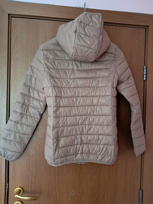 Олекотено  бежаво яке