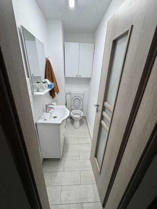 De vanzare apartament 2 camere decomandat 62mp utili parter inalt 2 bai