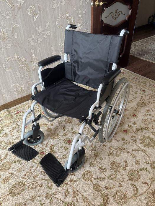 Инвалидная коляска