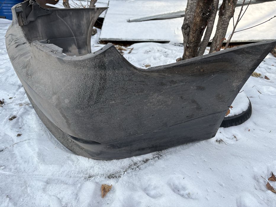 Продам. Комплект два бампера и проги BMW e 60