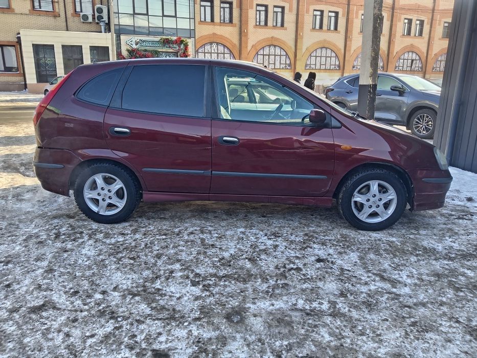 Ниссан алмера тино