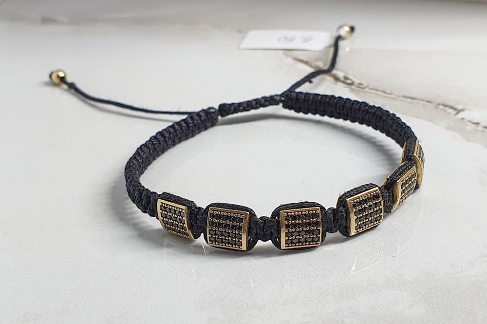 Brățară pe șnur cu aur de 14K și pietre semiprețioase onix – gramaj 5,
