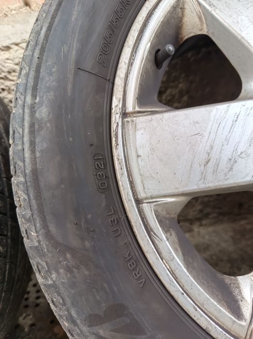 Jante originale R16 aliaj Aluminiu Renault Laguna 1  cu cauciucuri de vara 205/55/R16 și prezoane + roata rezerva