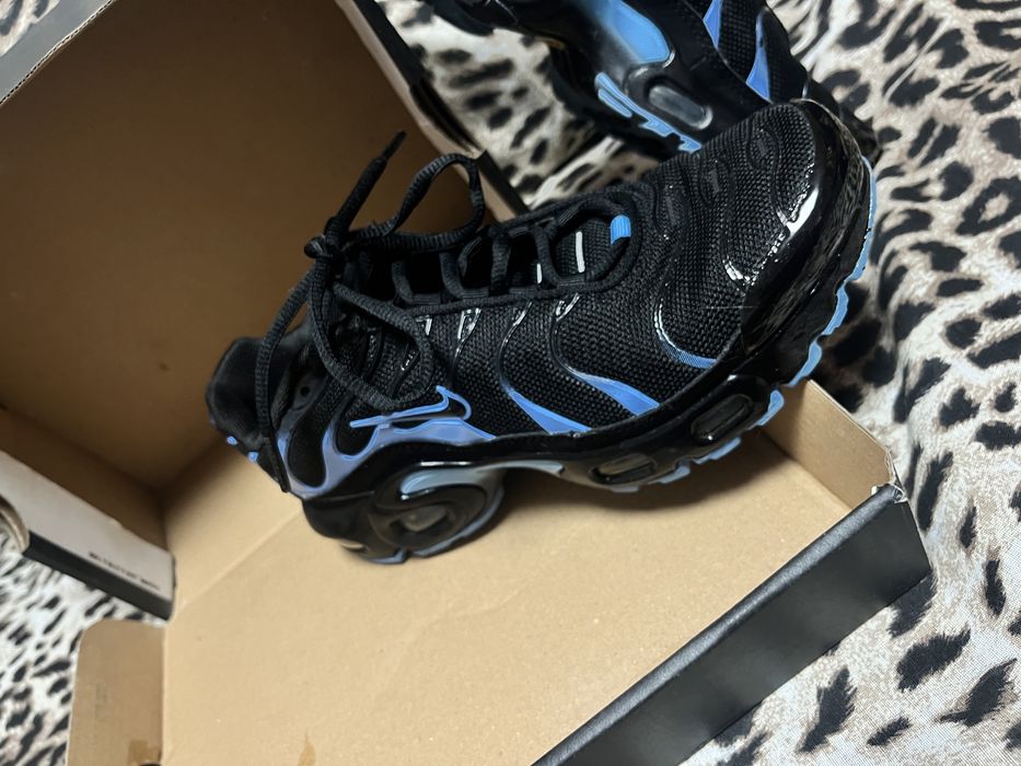 Nike Air Max Plus in the black and University Blue colorway.