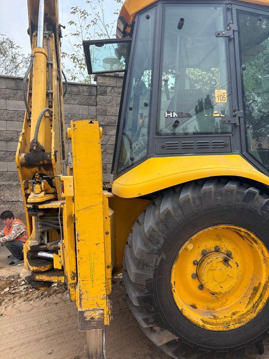 Экскаватор погрузчик 3в1