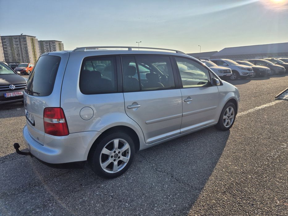 Vand Touran 7 locuri in acte