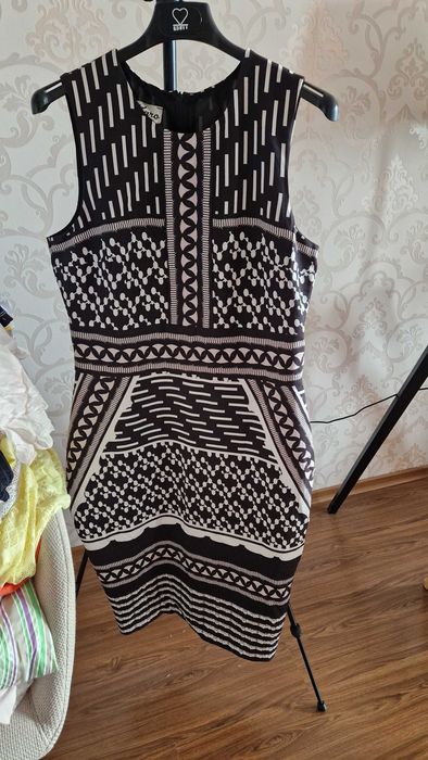 ЛиЛиквидация на дамски дрехи .