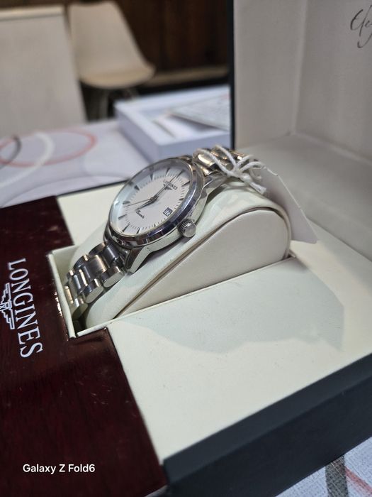 Longines quartz нов