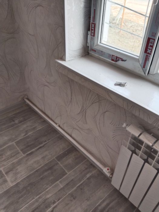 Ул.Беруни г.Янгиюль ПРОДАЮ 2-х ком.  ЕВРОРЕМОНТпервый этаж 2/1/2 СВОЯ