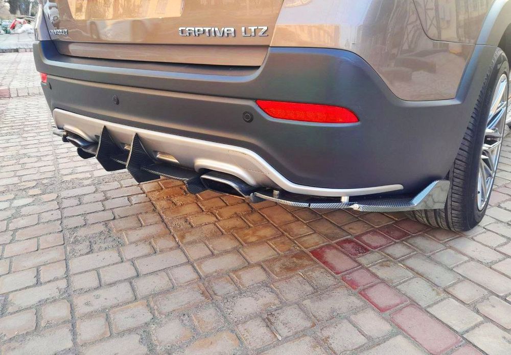 Продам  тюнигованные спойлера  на каптиву