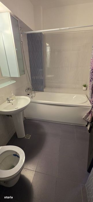 Zamca-bloc nou- 2 camere decomandate + loc de parcare