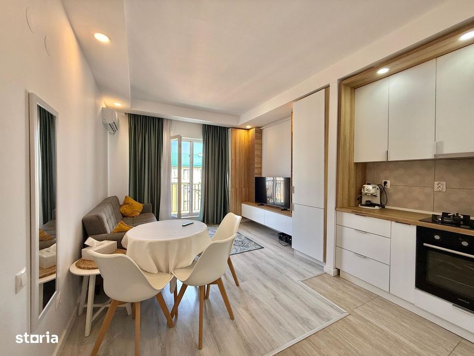 COSMOPOLIS - Apartament cu 2 camere tip studio, mobilat si utilat.