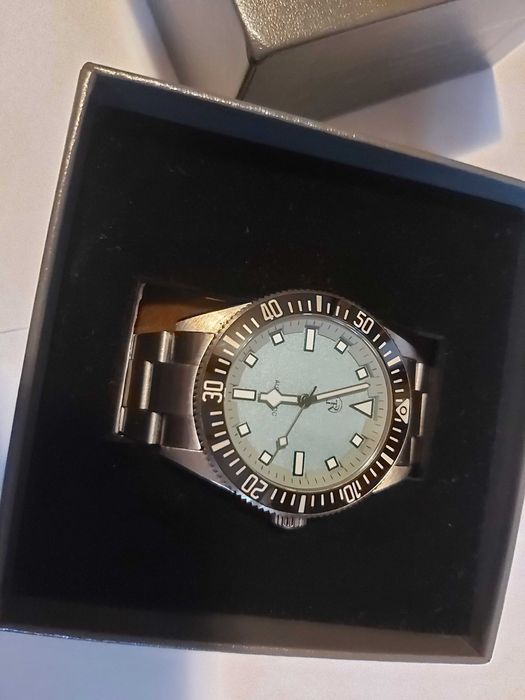 Ceas automat RollsTimi inox cu cadran albastru deschis (sky blue) și bezel ceramic
