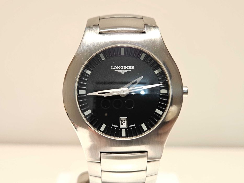 Продаван елегантен стомана кварц мъжки  дамски часовник"Longines"