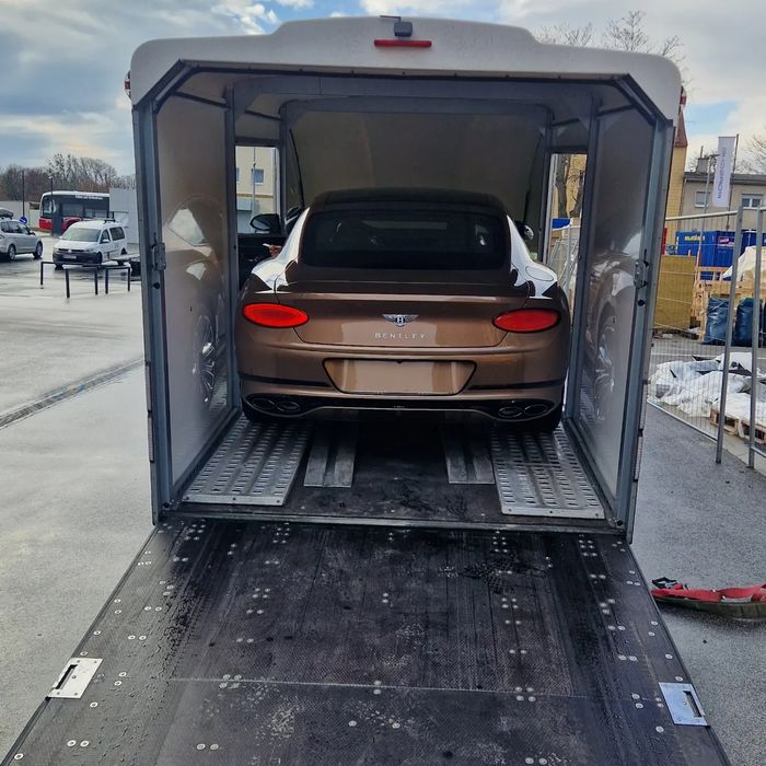 Tractare si transport autovehicule in platforma inchisa ,acoperita