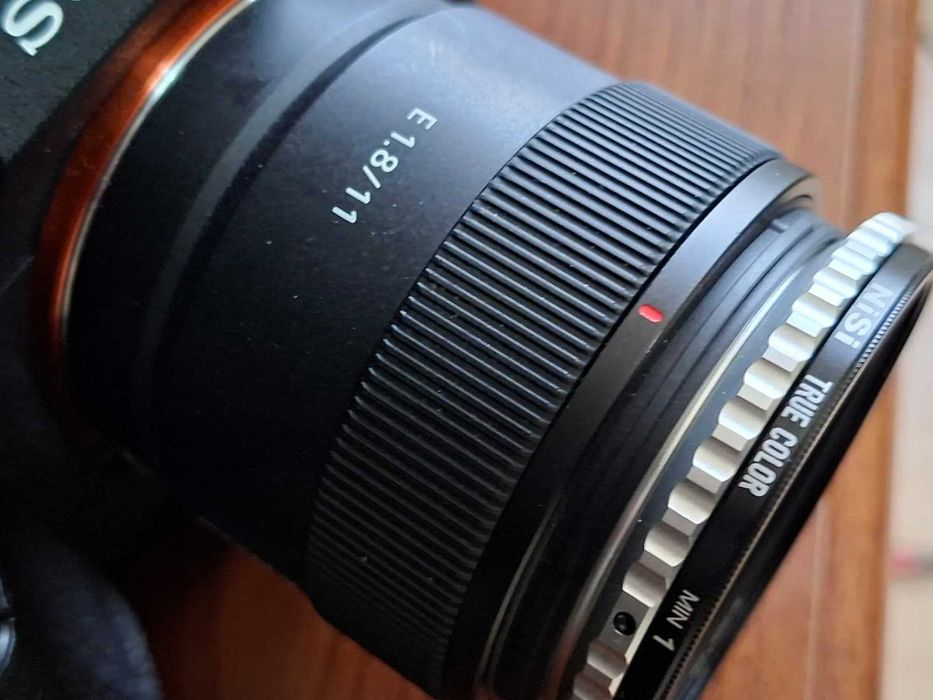 Vând obiectiv ultra-wide Sony E 11mm F1.8 (Preț redus, citiți descrierea) - Ideal Imobiliare sau fotografie pe timp de Zi