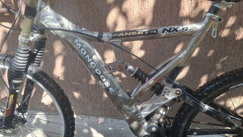 Bicicleta  MTB Mongoose NX pro 9.5, Mountain bike full suspension.