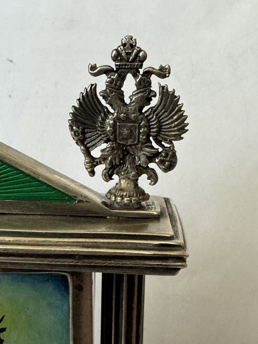 Уникална сребърна рамка Фебердже