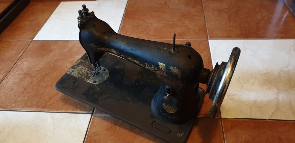 Mașină de cusut Singer