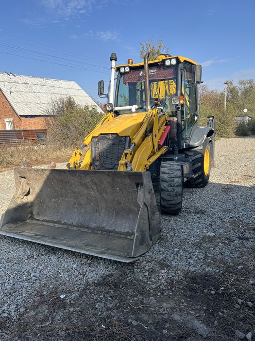 Услуги экскаватор-погрузчика