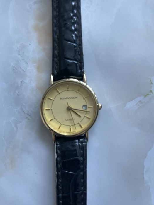 Продам часы Романсон