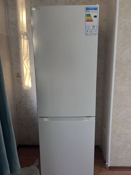 Новый холодильник.