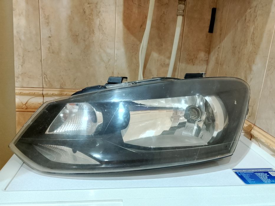 Левая фара Volkswagen Polo