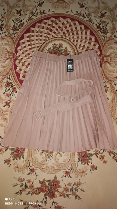 Юбка плиссированная.