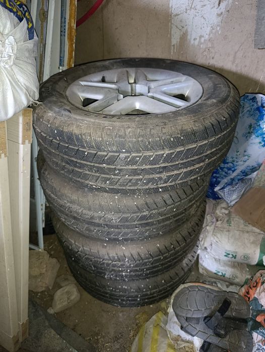 Диск с колесом 16дм на ниву