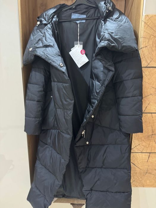 Продам пуховик зимний новый