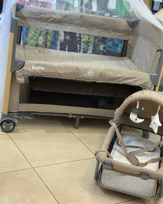Kidilo 4в1: кроватка, манеж, люлька и пеленальная зона.