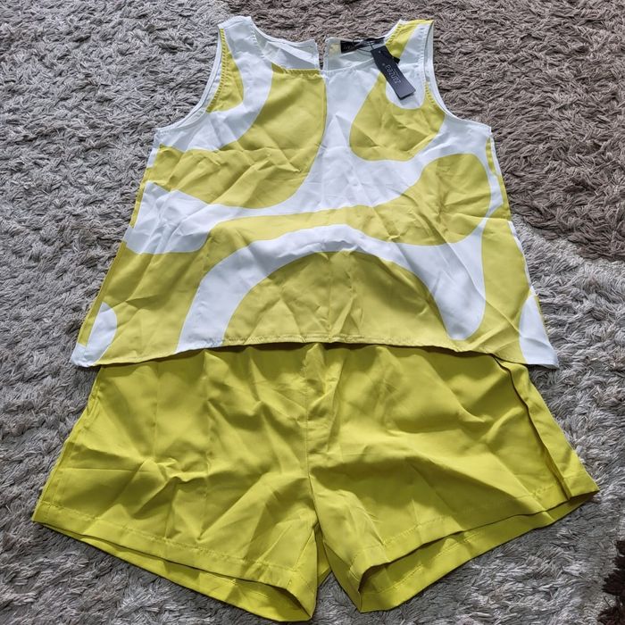 Продам летний костюмчик 46р