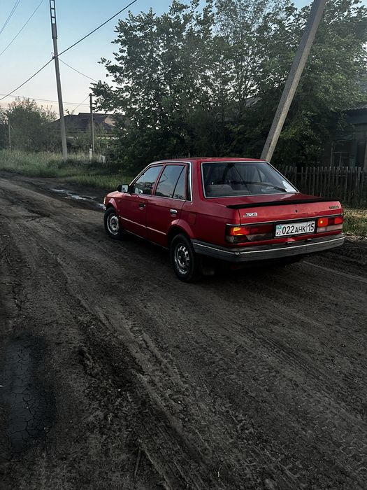 Мазда 323 BF машина