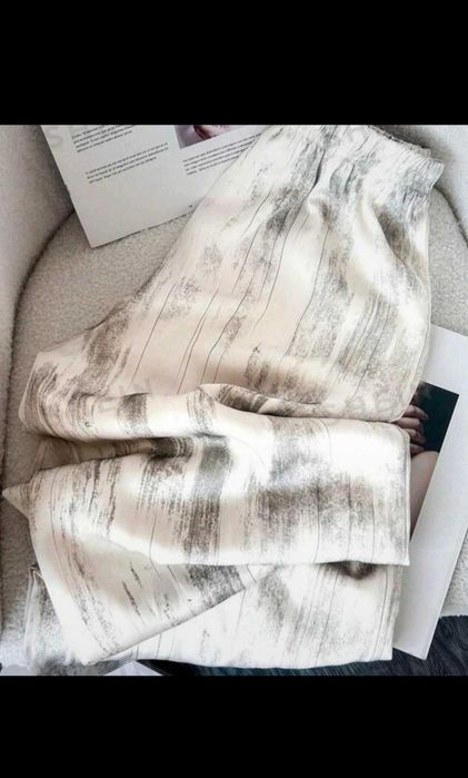 Pantaloni evazați/largi