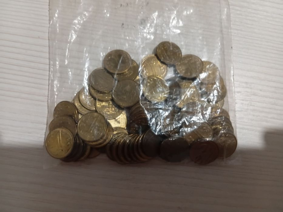 Монеты 1 и 2 тенге