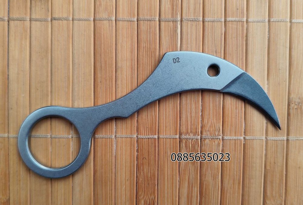 Карамбит с фиксирано острие