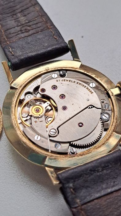 Ceas de Aur 14 K Elvețian Saturn De Luxe