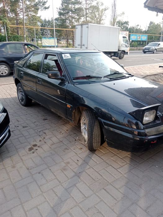 Продам машину Мазда 323