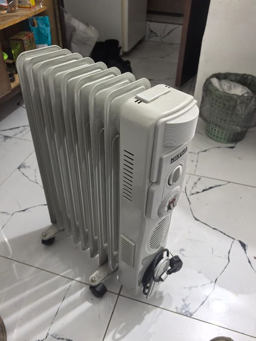 Продам масляный обогреватель