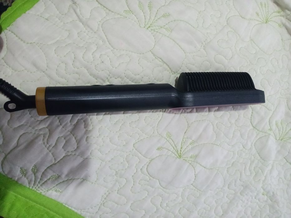 Perie de îndreptat părul