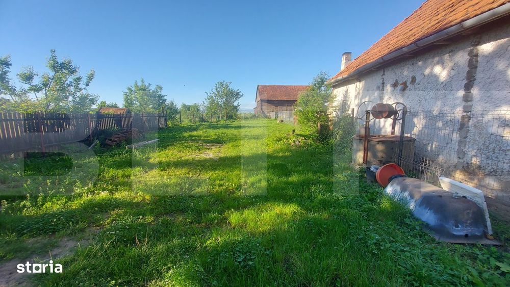 Casa cocheta din lemn masiv cu teren si livada – liniste, natura si