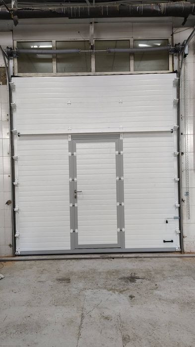 Секционные ворота Door Han