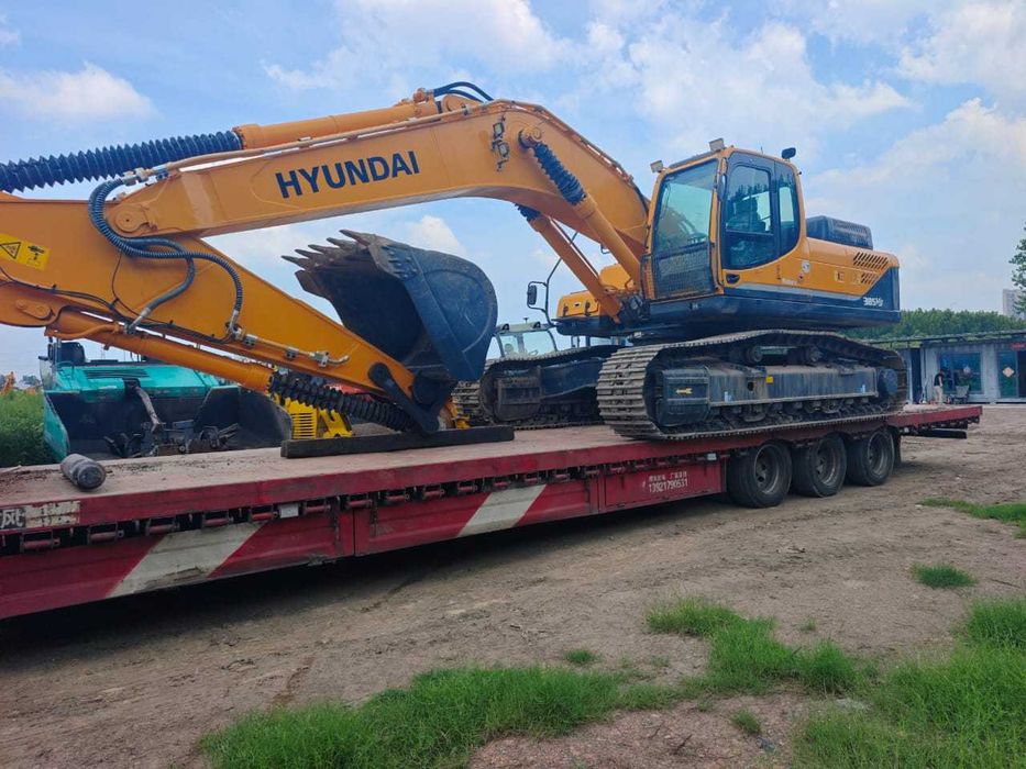 Аренда экскаватор Hyundai 385 с молотком
